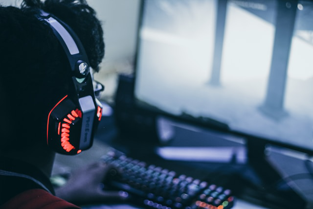 A gamer wearing headphones