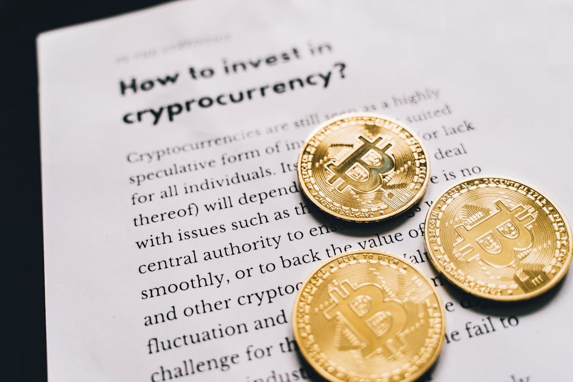 cryptocurrencies on a book’s page