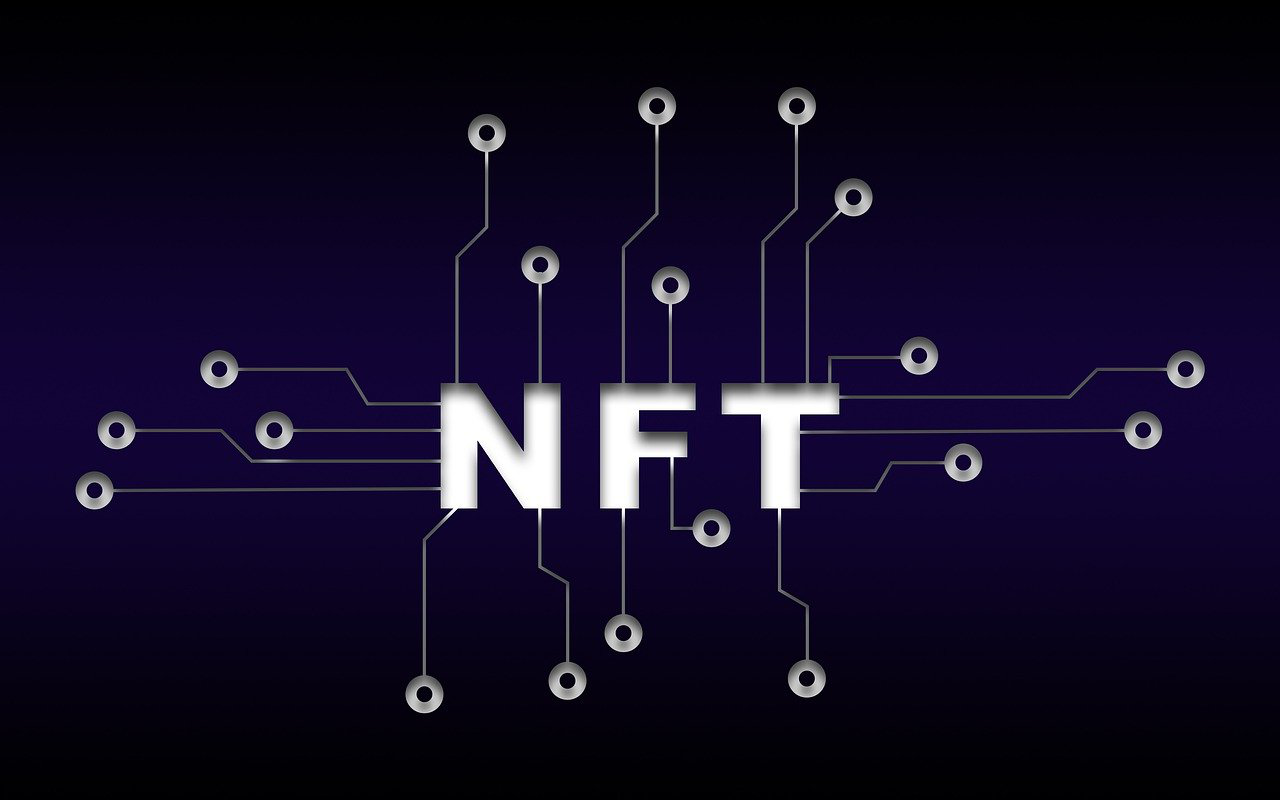 NFT written on a blue background