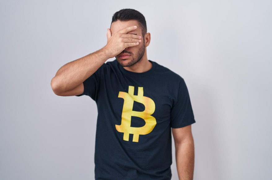 a man wearing a Bitcoin t-shirt