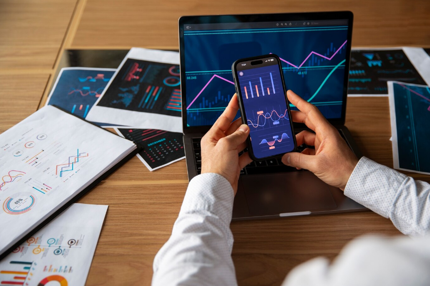 an office worker using finance graphs