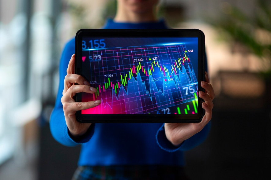 a person analyzing finance graphs