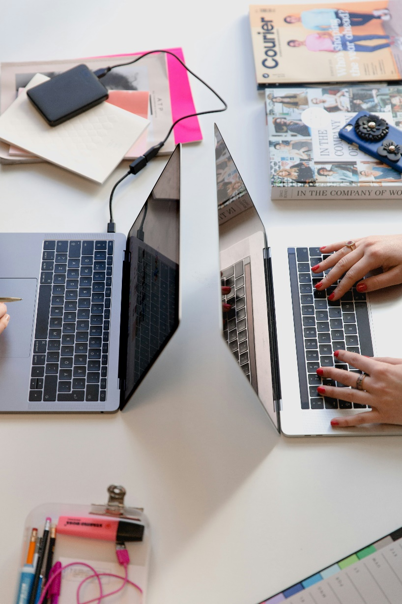 People typing on computers.