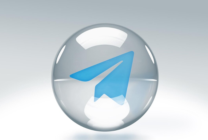 a transparent glass bubble with Telegram logo inside it