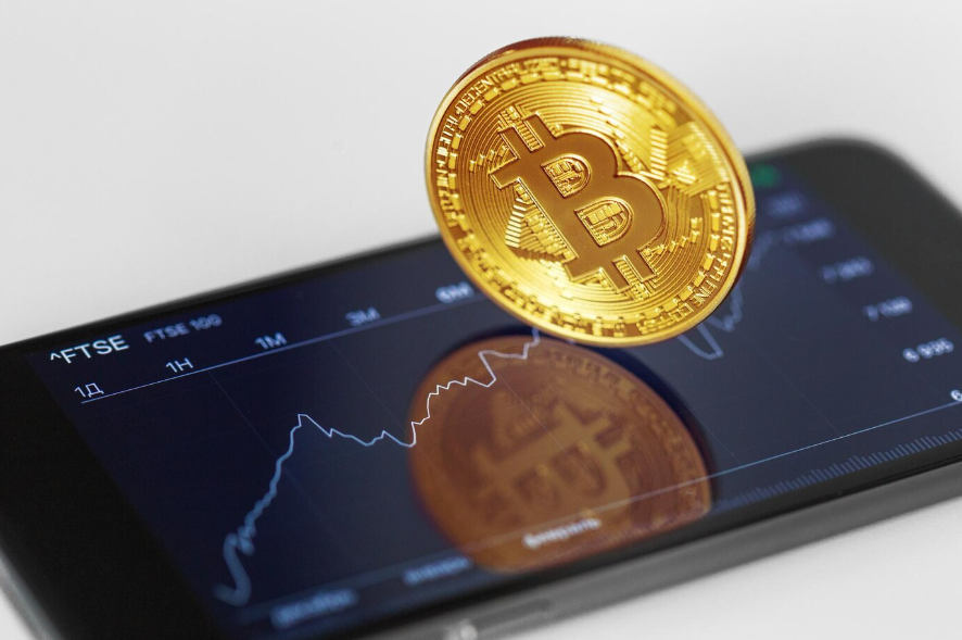 a Bitcoin on a phone