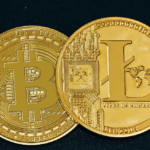 A close-up photo of a Bitcoin and Litecoin coin