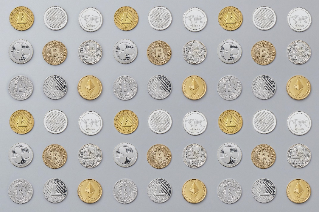 An array of various cryptocurrency coins, including Bitcoin, Ethereum, and Litecoin.