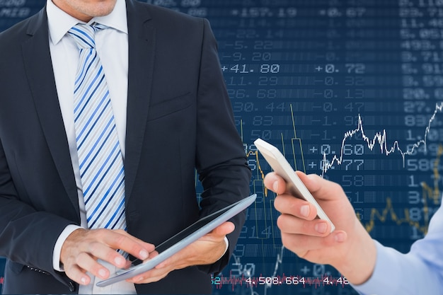 Digital asset management consultants looking at charts with structured product diagrams and interest rate swap lines