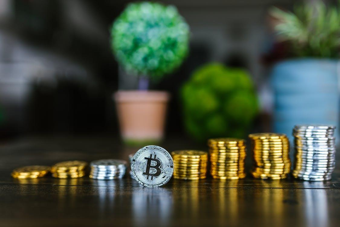 kenson Investments | Behind Closed Wallets: Movement Labs’ Secret Token Deals Unveiled close up shot of stock of coins