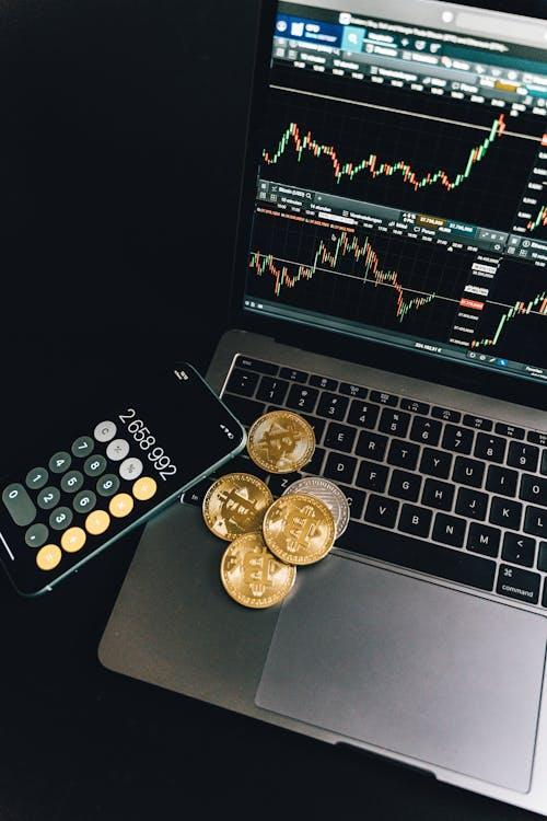 gold coins on the laptop