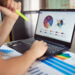 person using black laptop computer