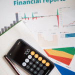 a document and calculator on the table