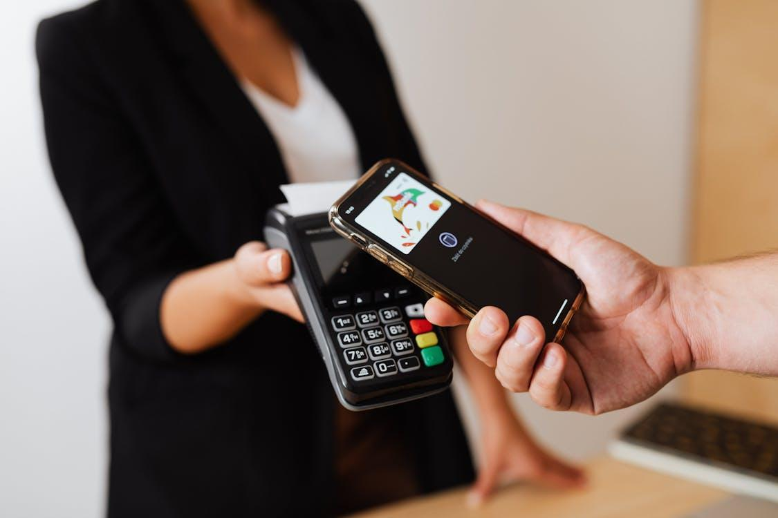 A person making a payment using smartphone