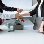 photo of people shaking hands