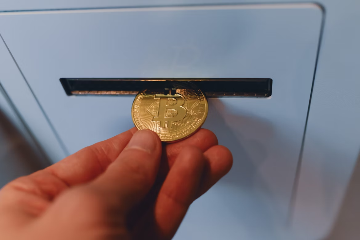 kenson Investments | Buy Bitcoin With Cash: How to Purchase Cryptocurrency in Person Bitcoin ATM machine used for cash-to-crypto transactions