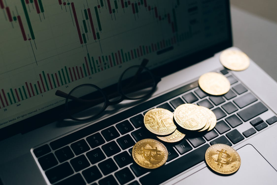 Stack of crypto coins representing growth in stablecoin yield markets.