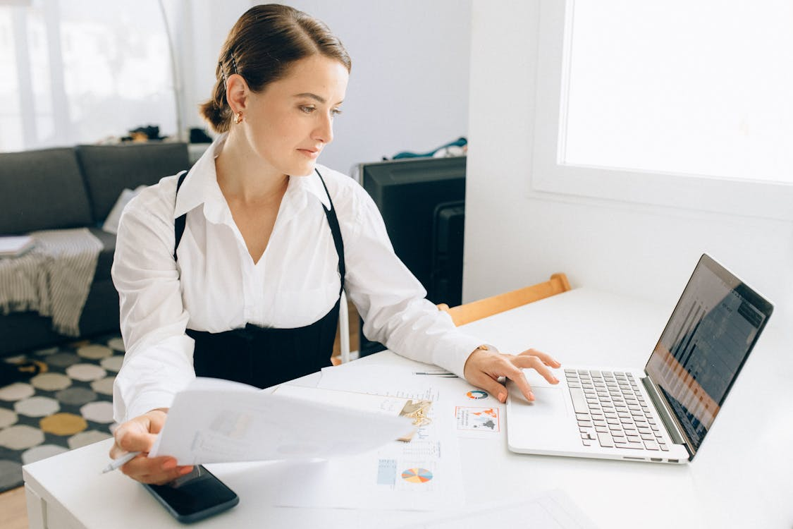 Analyst reviewing reserve balances and transaction records across multiple verification tools.