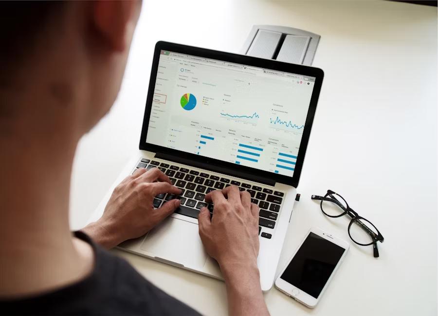Finance team reconciling blockchain transaction data with off-chain accounting dashboards using event-driven systems