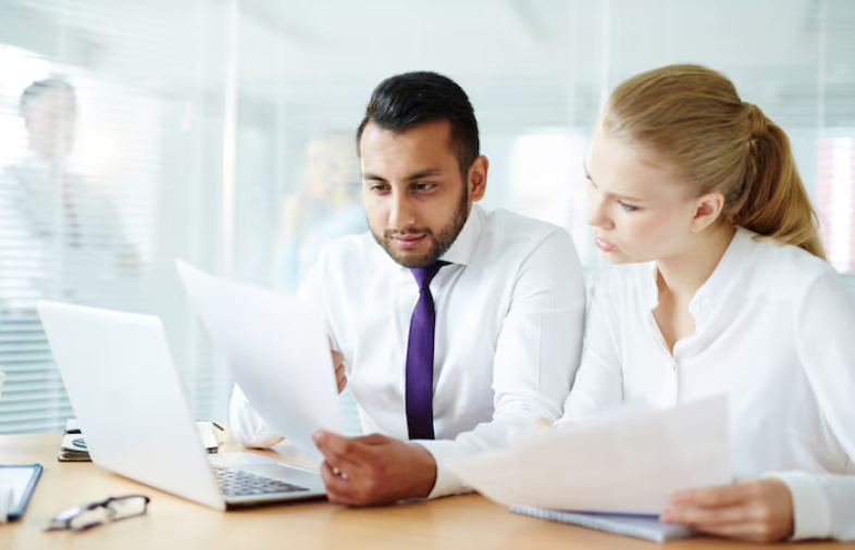 Digital asset specialist reviewing compliance metrics and pre-trade exceptions for operational transparency.
