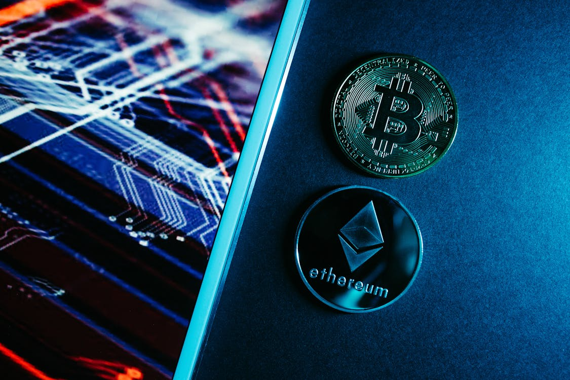 Laptop displaying cryptocurrency charts and market data, representing digital asset analysis.
