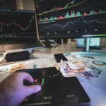 trader analyzing digital asset price charts across multiple screens with financial data.