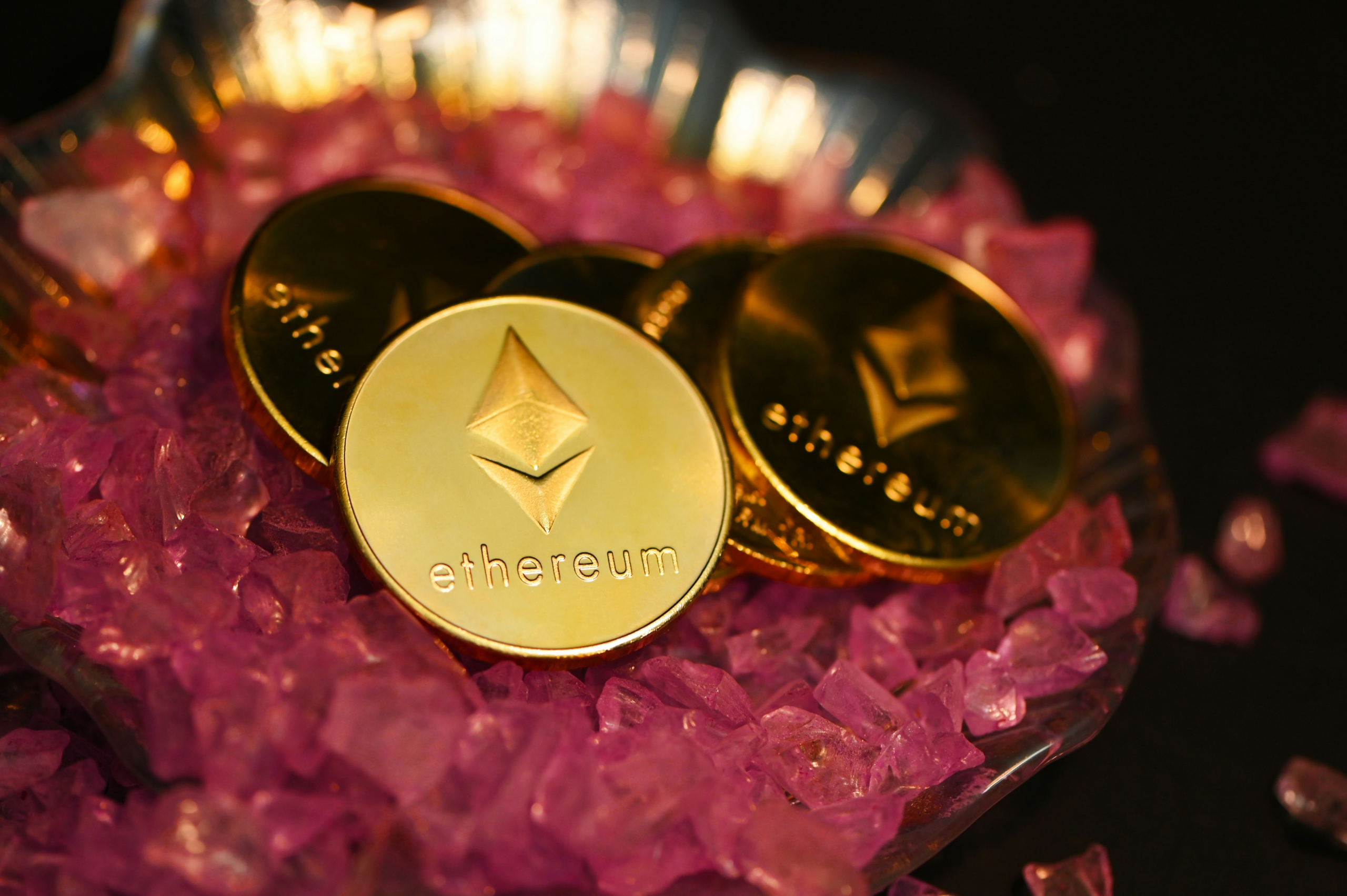 ethereum coins placed on decorative surface
