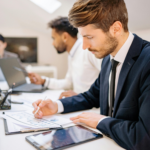 financial professional reviewing charts and data to assess risk and performance in digital asset markets