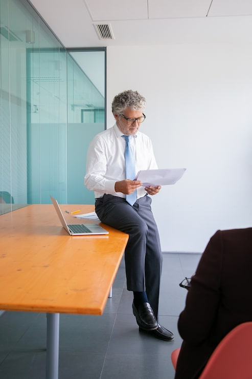An investor reviewing a report.