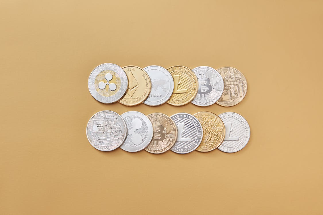 coins representing different cryptocurrencies