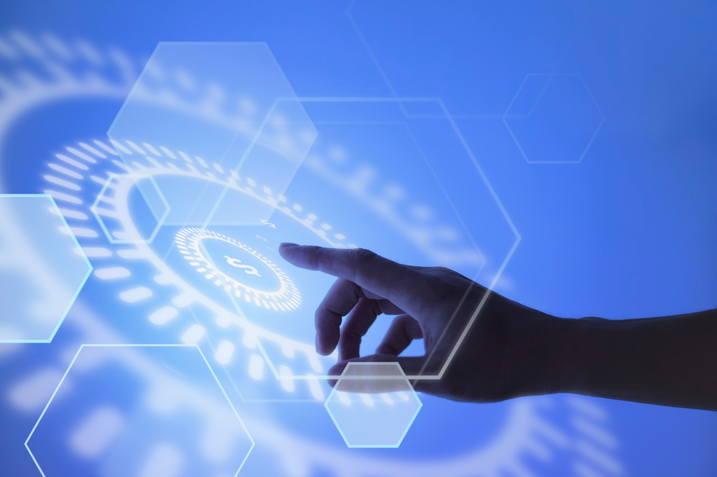 Close-up of a hand pointing toward a digital currency display on a blue glowing blockchain node network background.
