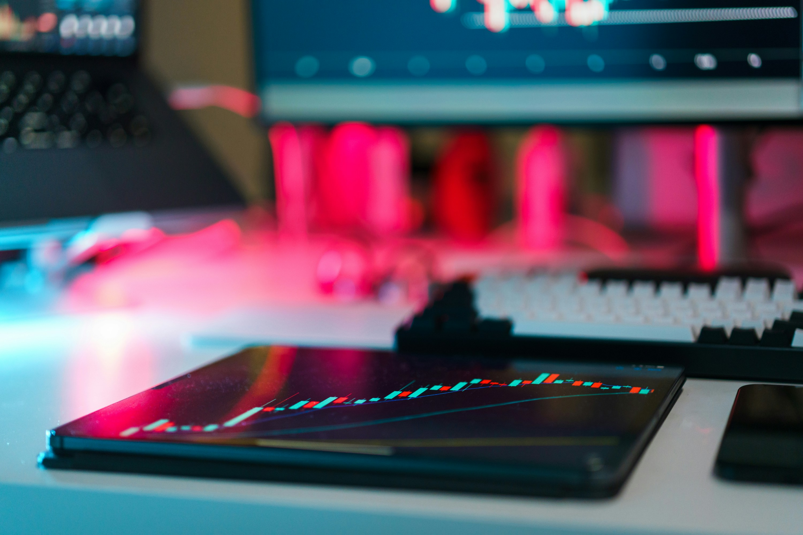kenson Investments | Pontes Approaches Launch: Europe’s Next Step Toward Tokenized Settlement in Central Bank Money Laptop and tablet displaying financial charts in a professional workspaceCaption: