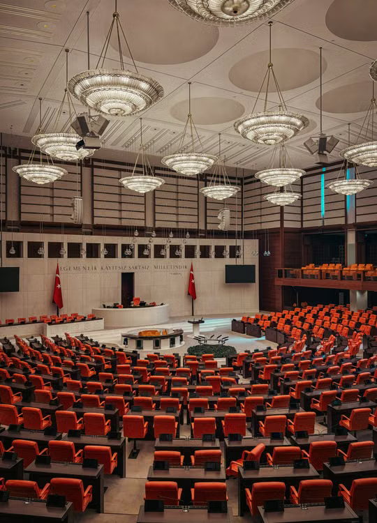 An empty Senate committee hearing room set up for a legislative markup session. Caption: Markup sessions like the one held on May 14, 2026, show why evaluating digital asset consulting firms increasingly means checking how closely they track legislative developments.