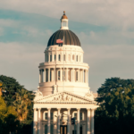 kenson Investments | Understanding California's New Digital Asset Framework: What Market Participants Should Know The California State Capitol building against a blue sky, symbolizing new state-level digital asset legislation.