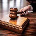 A gavel resting on a table
