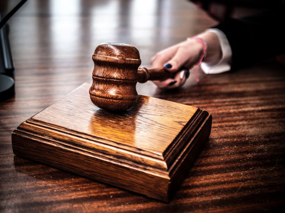 A gavel resting on a table
