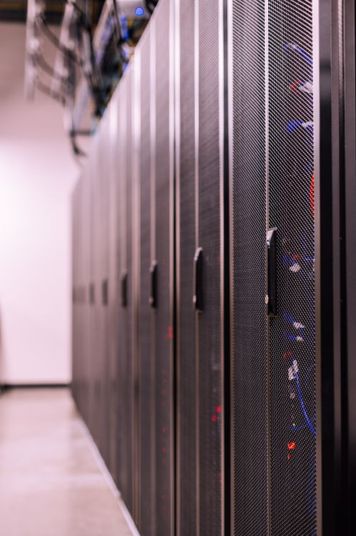 kenson Investments | How Tokenization Is Expanding Blockchain's Real-World Applications Server room representing enterprise grade blockchain infrastructure used by financial institutions