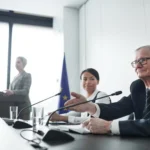 officials participating in a hearing
