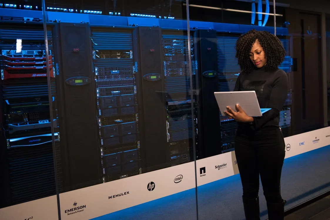 Technology and operations representatives reviewing network access permissions, cybersecurity controls, and shared infrastructure responsibilities.