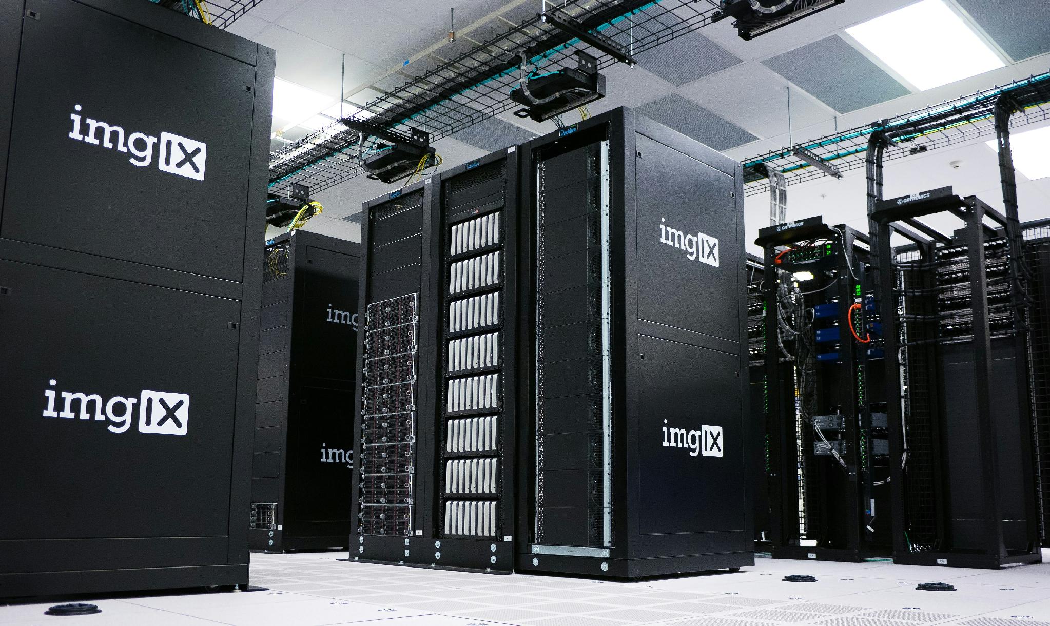 Rows of server racks in a data center representing the computing infrastructure supporting blockchain networks