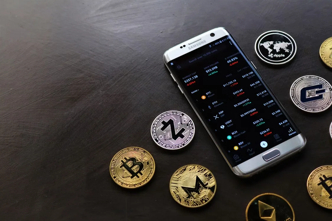 A smartphone displaying a cryptocurrency platform