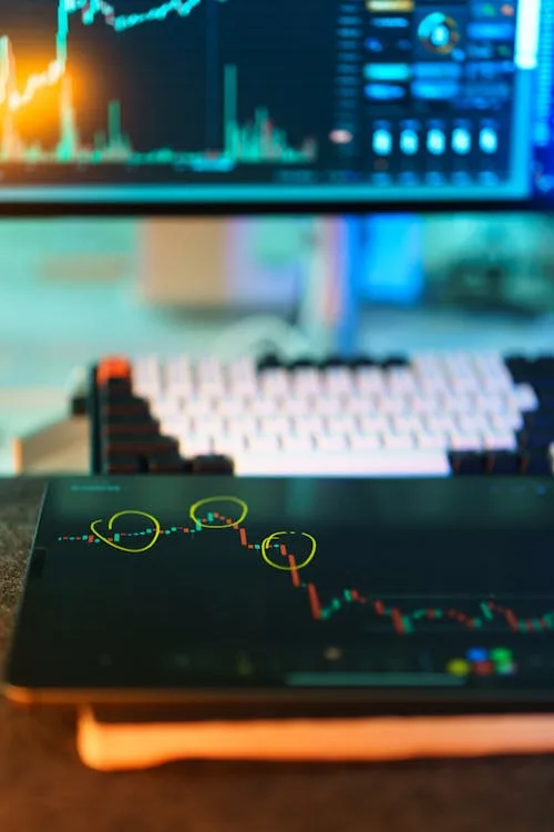 Digital asset market charts displayed across screens representing ongoing on-chain monitoring and market analysis.