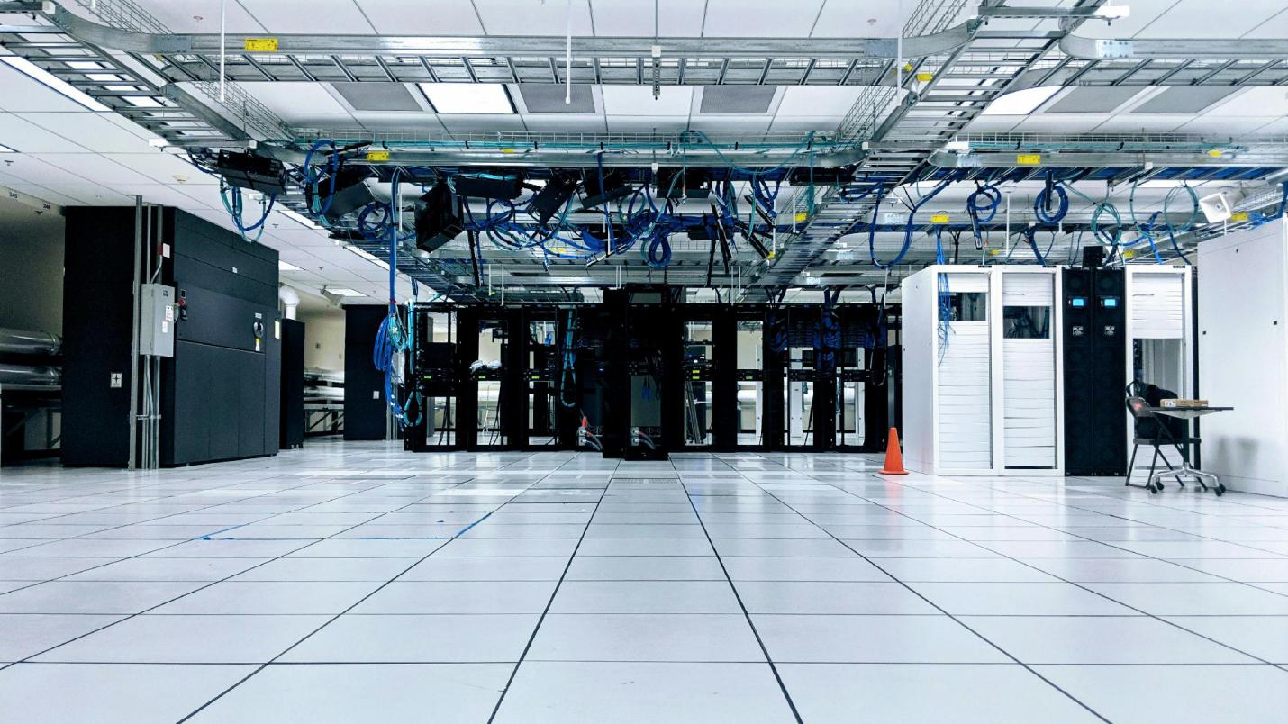 Server room with network cabinets supporting digital market and transaction infrastructure